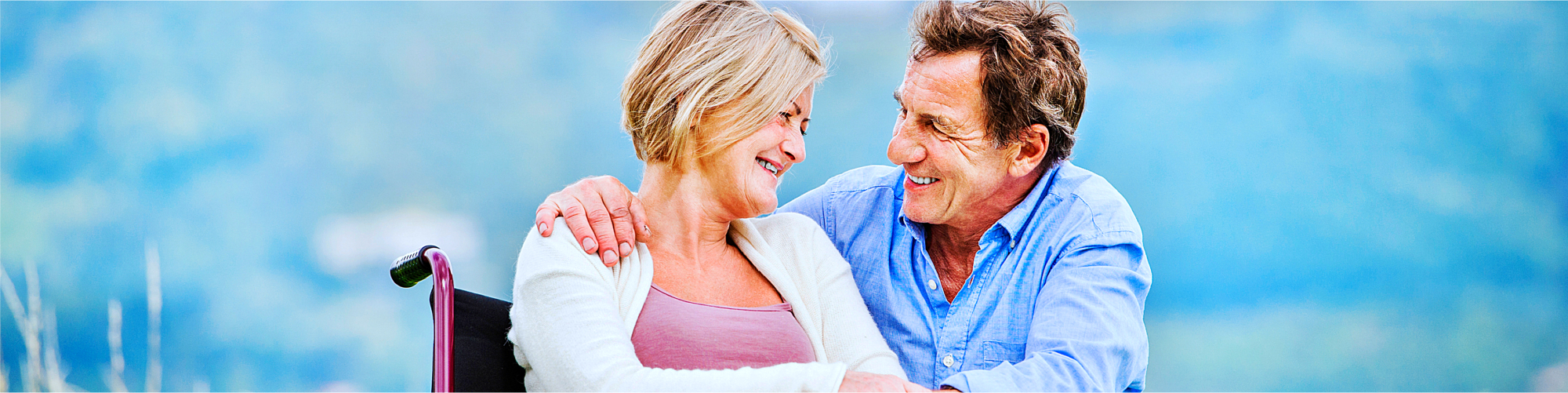 caregiver and senior woman smiling